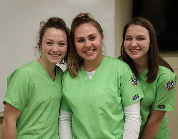 /_resources/images/highschool/ece-nurse-three-female-students-mobilehero.jpg