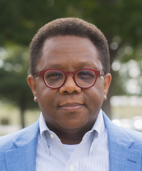 Man wearing red-framed glasses