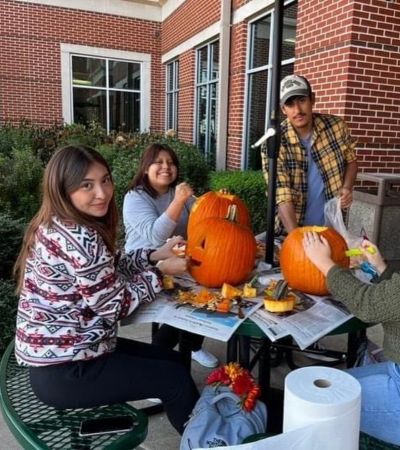 Students Carving Pumpkins