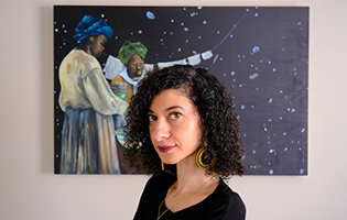 A Woman Standing Infront of a Painting of Stars